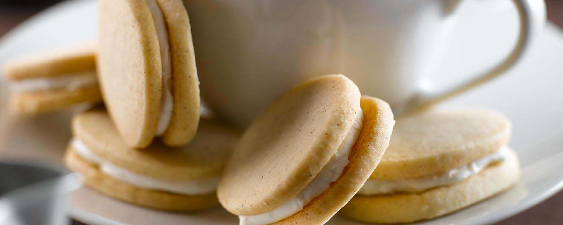 Photo for - Cardamom and Lime Sandwich Cookies with Chai Floating Islands